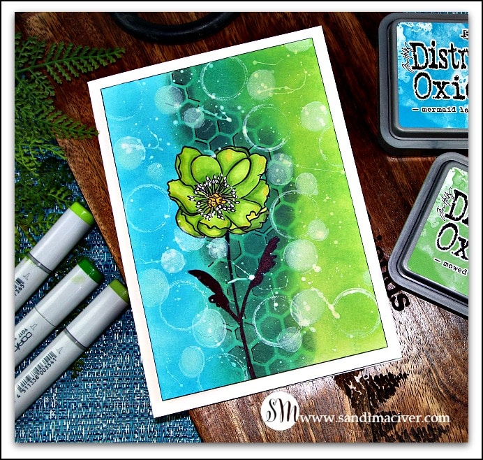 NEW CARD MAKING VIDEO - Distress Oxide Ink Simple Backgrounds #4 on how to create this beautiful green and blue background card with the fabulous flower in the middle designed by sandimaciver.com