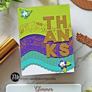 colorful hand made card created with the Spellbinders April Glimmer of the Month Kit