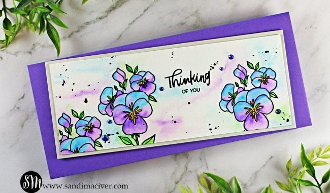 hand made slimline card with pansies stamped from Ellen Hutson LLC