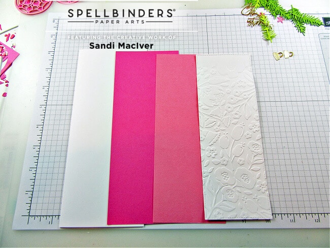 pink layers of card stock to create the slimline christmas card