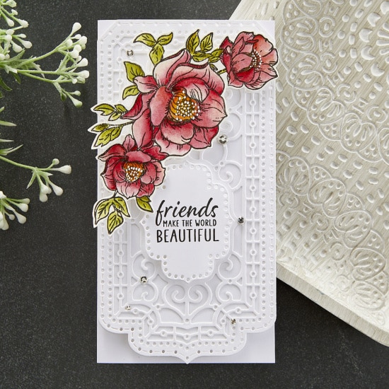 handmade mini slimline card with a colored floral overlay created with July club kits from Spellbinders