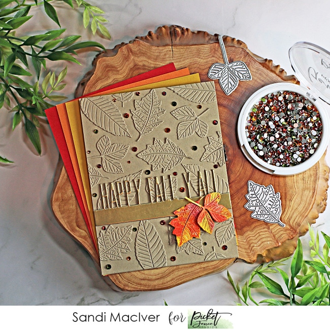 fall themed hand made card with a leaf die cut background and watercolor leaf overlay using paper crafting products from Picket Fence Studios