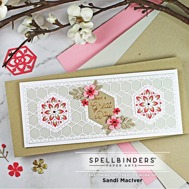 handmade slimline card with three kaleidoscope hexagons cut into it with cardmaking dies from Spellbinders