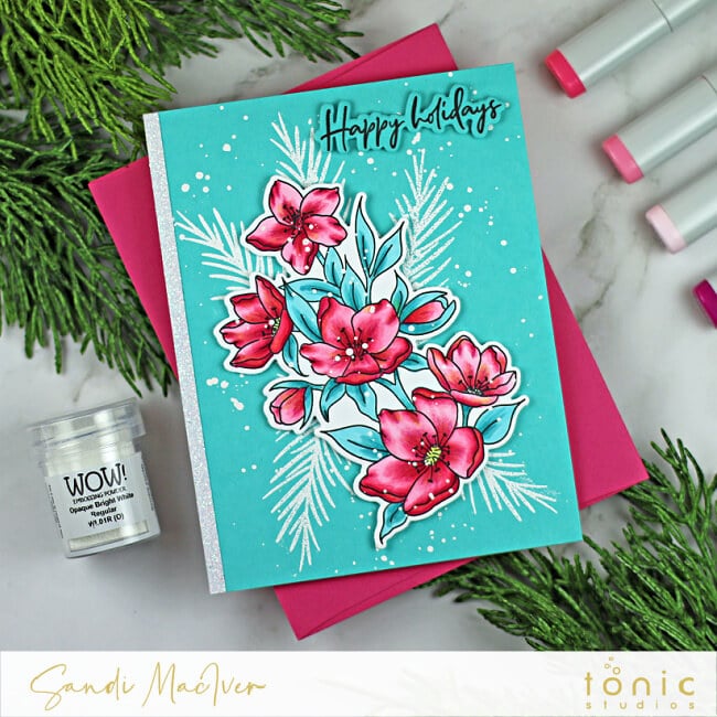 hand made blue christmas card with pink colored flowers created with new paper crafting products from Tonic Studios