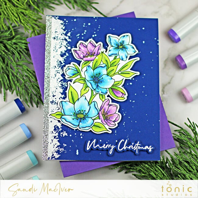 Navy hand made card with blue and purple colored flowers on the front created with paper crafting supplies from Tonic Studios