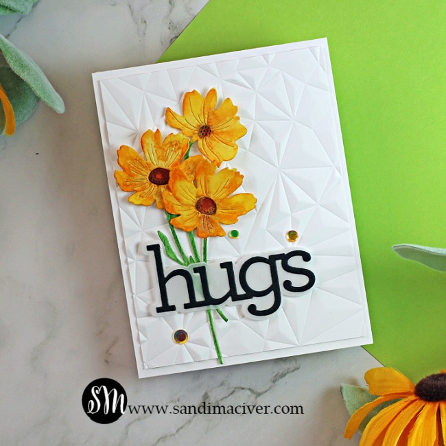 handmade white card with an embossed front and three yellow watercolored flowers using paper crafting products from SImon Says Stamp