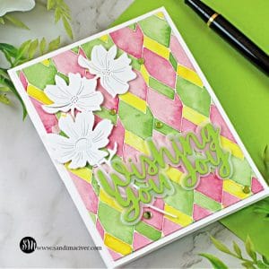 handmade card with a watercolored background and die cut flowers and sentiment created with new paper crafting products from Simon Says Stamp