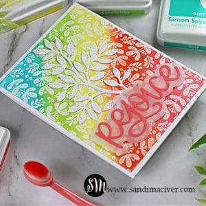 a handmade rainbow christmas cards using new card making products from Simon Says Stamp