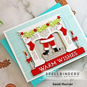 handmade greeting card with santa coming down the chimney using new die cutting paper crafting products from Spellbinders