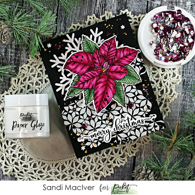 handmade black christmas cards with a dark pink poinsettia and snowflake created with card making and paper crafting products from Picket Fence Studios.