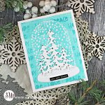 handmade blue and white christmas card with a set of trees and a snowglobe created from new paper crafting products from SImon Says Stamp