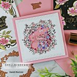 handmade card in pink and white with glimmer foil crest and shaker created with paper crafting products from Spellbinders