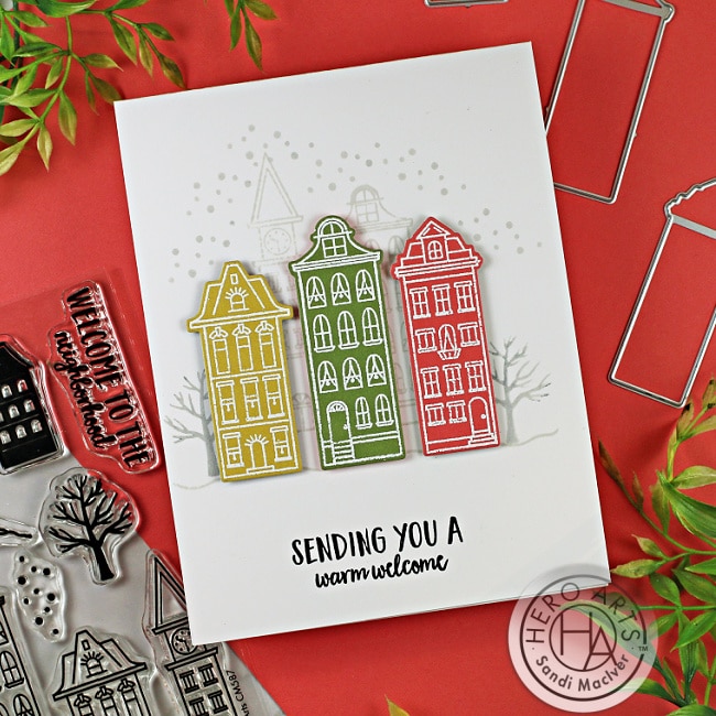 handmade greeting card with three cut out houses created with new products from Hero Arts