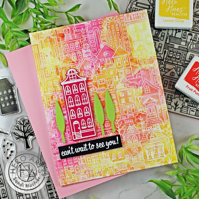 handmade card with a yellow and pink watercolor background and a pink townhouse created with new paper crafting products from Hero Arts