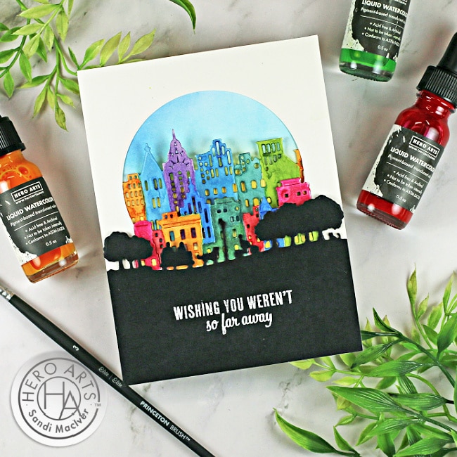 hand made watercolor card with a watercolor city scape using new card making supplies from Hero Arts