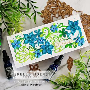 hand made slimline card in green and blue watercolor using card making products from Spellbinders