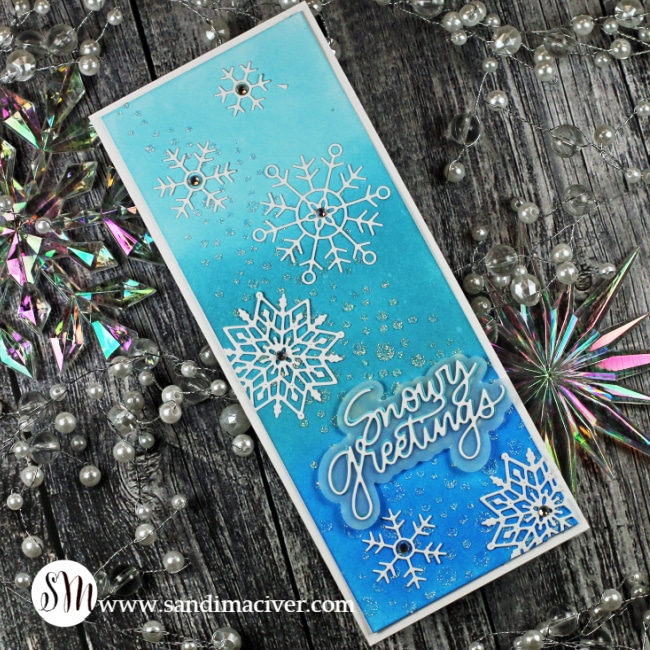 handmade slimline card in shades of blue with die cut snowflakes using new cardmaking products from SImon Says Stamp