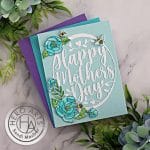 handmade mother's day card in blues and whites with a oval center die cut and flowers and bees using new card making products from Hero Arts