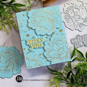 gold foiled Peonies covering the front of a blue hand made card using card making supplies from Simon Says Stamp