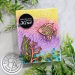 Rainbow colored handmade shaker card with fish and coral created with new cardmaking supplies from Hero Arts