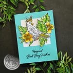 blue and white handmade card with colored cockatoo, leaves and flowers created with new card making supplies from Hero Arts