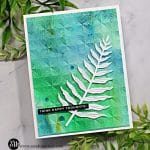 handmade card with a green and blue watercolor background and a die cut fern using new cardmaking supplies from Simon Says Stamp