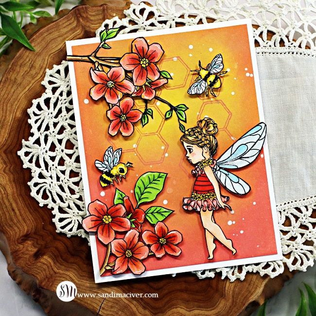 handmade card with flowers bees and fairies using new card making products from Colorado Craft Company