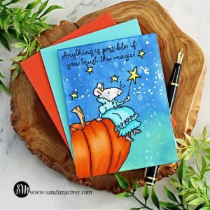 hand made greeting card with a little mouse sitting atop a beautiful pumpkin with her magic wand created using new card making products from Colorado Craft Company