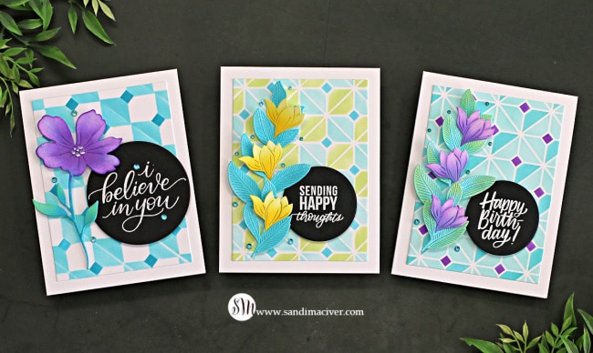 three handmade cards with a layered stencil background using the Dimensional Cube Stencil from Simon Says Stamp