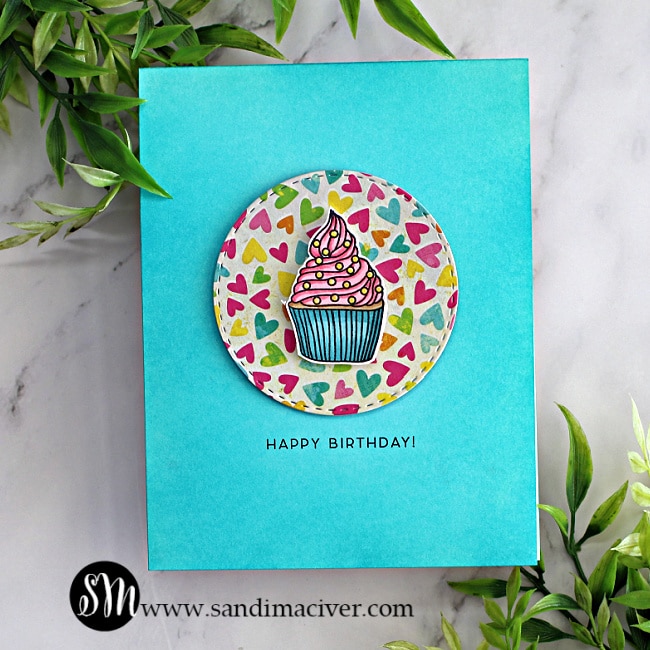 SImon Says Stamp Let's Celebrate hand made birthday card with a blue background and a pretty cupcake in the center created with new products from Simon Says stamp