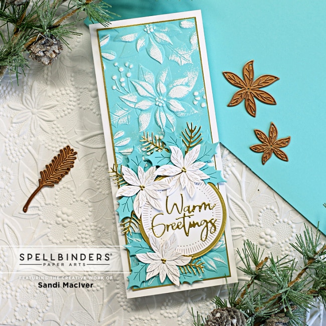 pale blue slimline card with white embossed poinsettia created with new card making supplies from Spellbinders