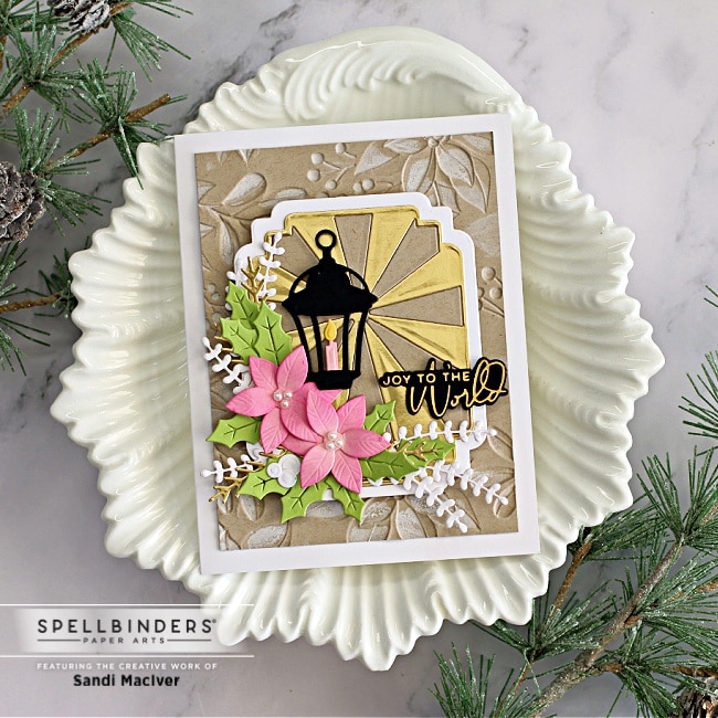 handmade christmas card with die cut lamp and poinsettia created with new card making supplies from Spellbinders