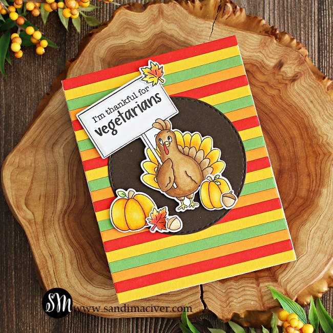 handmade greeting card with a striped background and a colored turkey created with new card making products from Simon Says Stamp