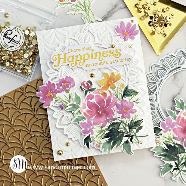 handmade greeting card with a white embossing background and florals great with new card making supplies from Pinkfresh Studio