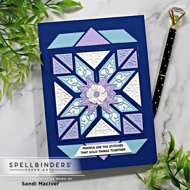 handmade gift card with a filigree quilted design in blues and purples, created with new card making supplies from Spellbinders