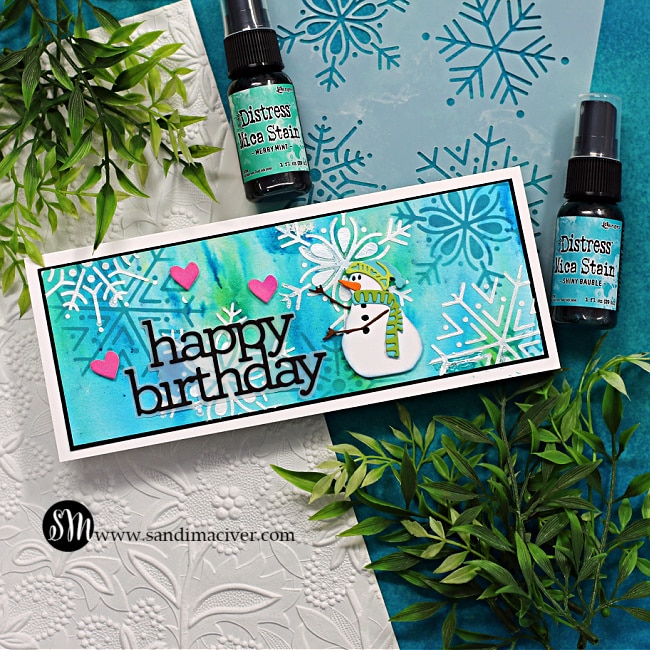 handmade slimline birthday card with a watercolor background, white embossed snowflakes and a little snowman