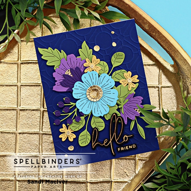 handmade greeting card with a dark blue embossed background and purple and blue florals created using new card making products from Spellbinders