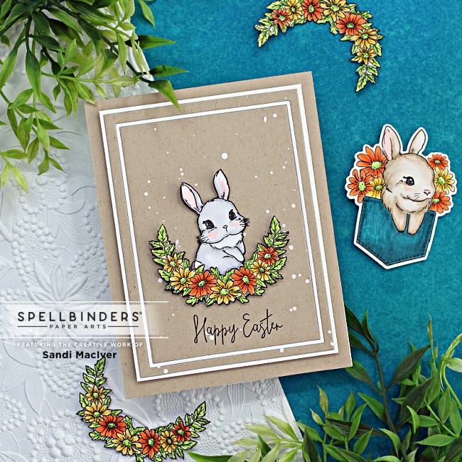handmade easter card with a white bunny and a floral wreath created using new card making supplies from Spellbinders