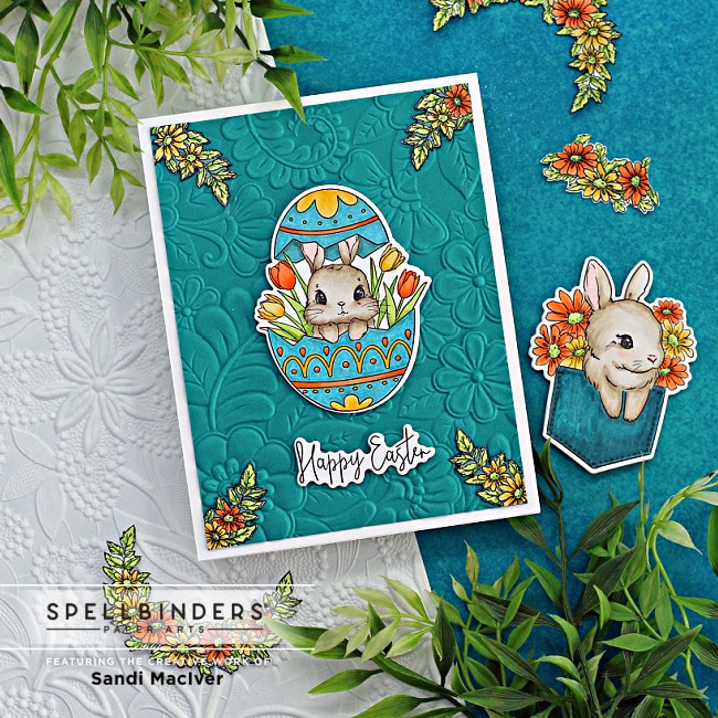 hand made easter card with a bunny inside an egg on an embossed background created with new card making supplies from Spellbinders