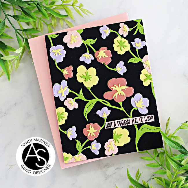 handmade greeting card covered in die cut flowers on a black background created with new cardmaking supplies from Alex Syberia Designs