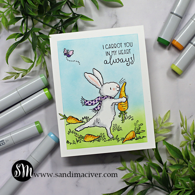 handmade greeting card with a bunny holding a carrot created with new card making supplies from Colorado Craft company