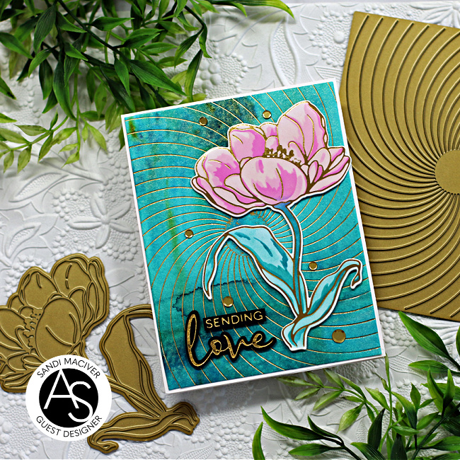 handmade greeting card with a green/blue watercolor background and a stenciled pink and blue tulip created with new card making supplies from Alex Syberia Designs