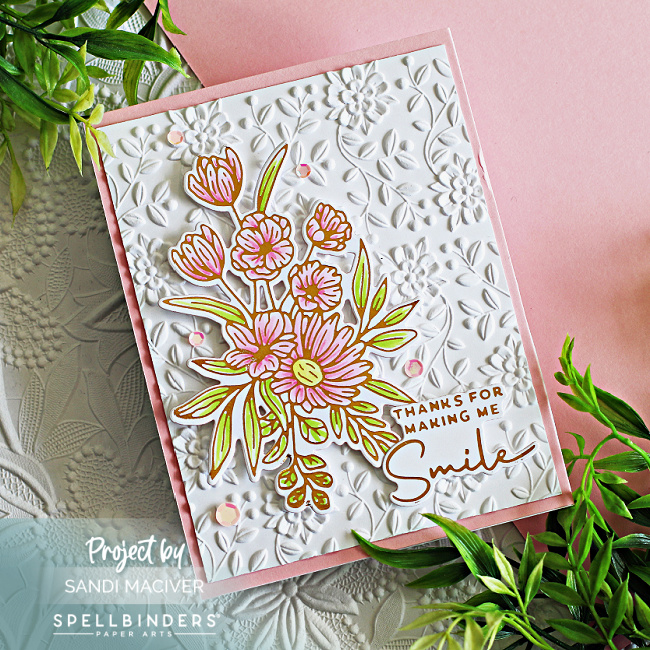 pink and white hand made card with pink florals on a white embossed background created with new cardmaking supplies from Spellbinders
