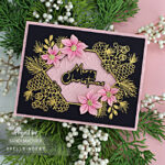 Handmade christmas card in Black and Pink with gold foil and pink die cut poinsettia created with new card supplies from Spellbinders