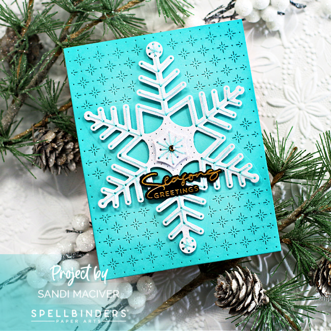 handmade christmas cards with a debossed background and a huge die cut and stitched snowflake created with new cardmaking products from Spellbinders