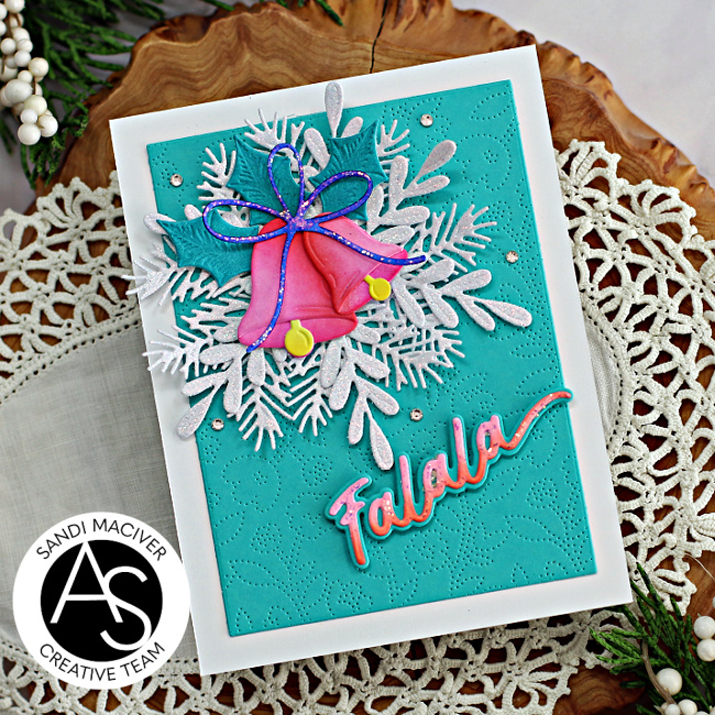 hand made christmas card with pink bells and a teal background created with new card making supplies from Alex Syberia Designs
