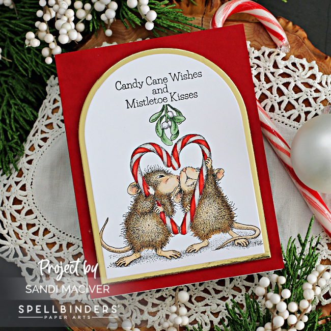 hand made christmas card with two mice kissing under the candy cane mistletoe created with new card making products from Spellbinders