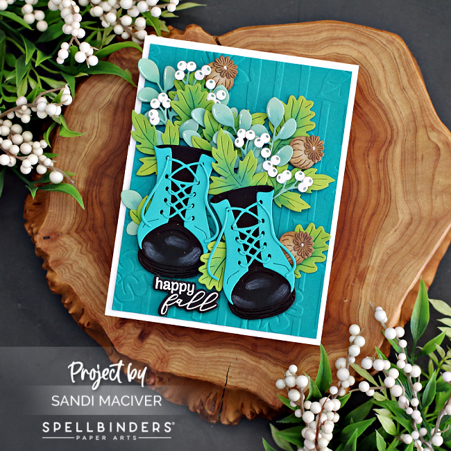 hand made greeting card with die cut boots and fall foliage created with new card making products from Spellbinders