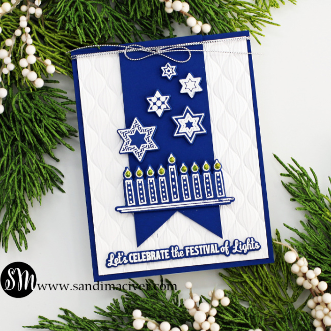 Blue and white hand made Hanukkah card with a Menorah and stars created with card making supplies from Simon Says Stamp