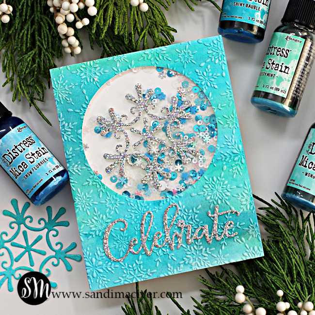 hand made blue white and silver shaker card with a cut out for a shaker card and a snowflake overlay created with new card making supplies from Simon Says Stamp